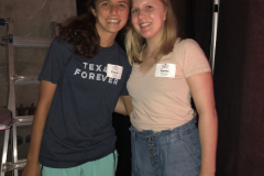 Two duchesses smiling at the camera